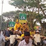 Naik Gerobak, Pasangan Erwin-Sahid Daftar ke KPU Parimo