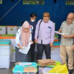 KPU Parimo Buka Kotak Suara Pilkada Parimo