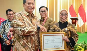 Sekda Sulteng Borong Dua Penghargaan Nasional di Proper Expo LAN RI 2025
