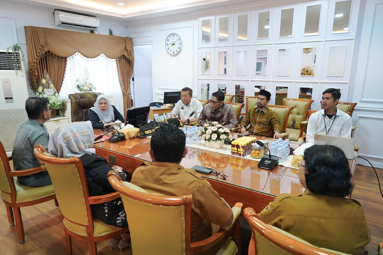 Komisi Informasi Sulteng Laporkan Hasil Monev PPID 2025 kepada Wagub Reny