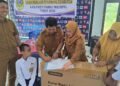Adrian Siswa SLB Parigi Terima Bantuan Kursi Roda dari Dinsos Parimo